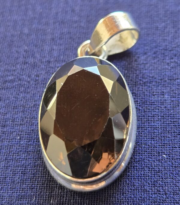 Dark coffee diamond cut stone