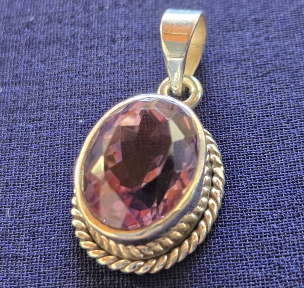 Purple oval stone with a parameter
